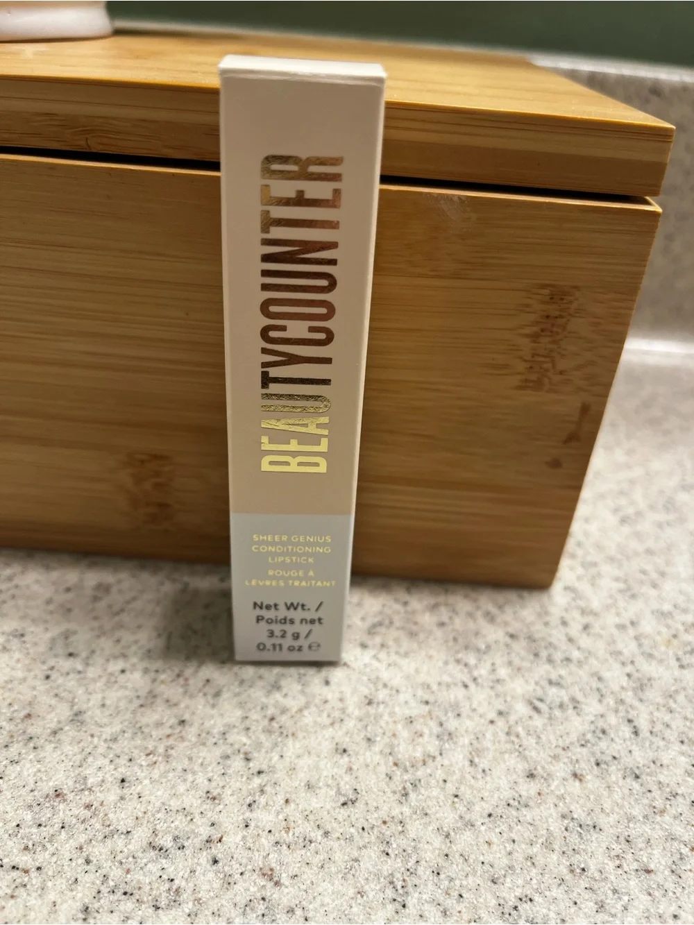 Pearl colored sheer conditioning lipstick